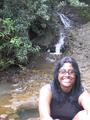 Premila at waterfall on the road to Hana